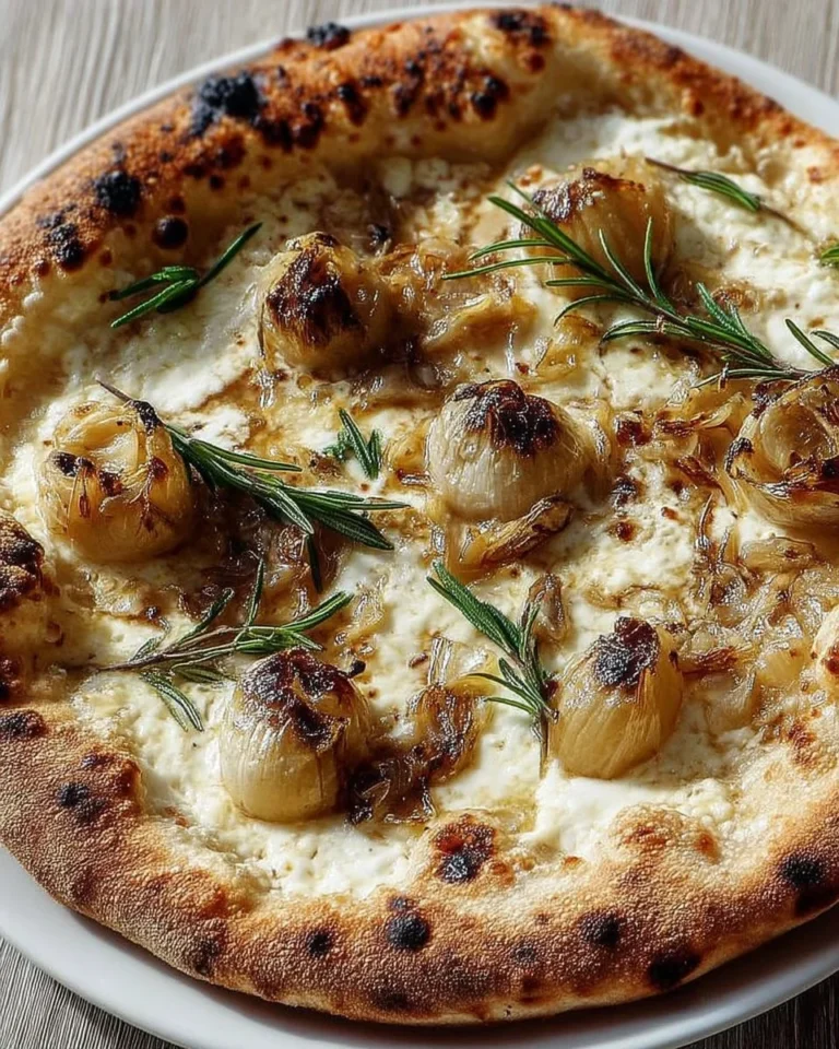 Pizza blanche avec ail confit, romarin et ricotta fondante